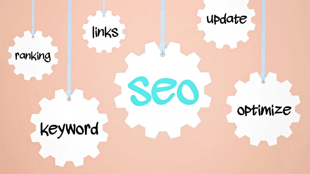 An image of hanging scalloped edged round card with SEO inspired keywords written on the card.