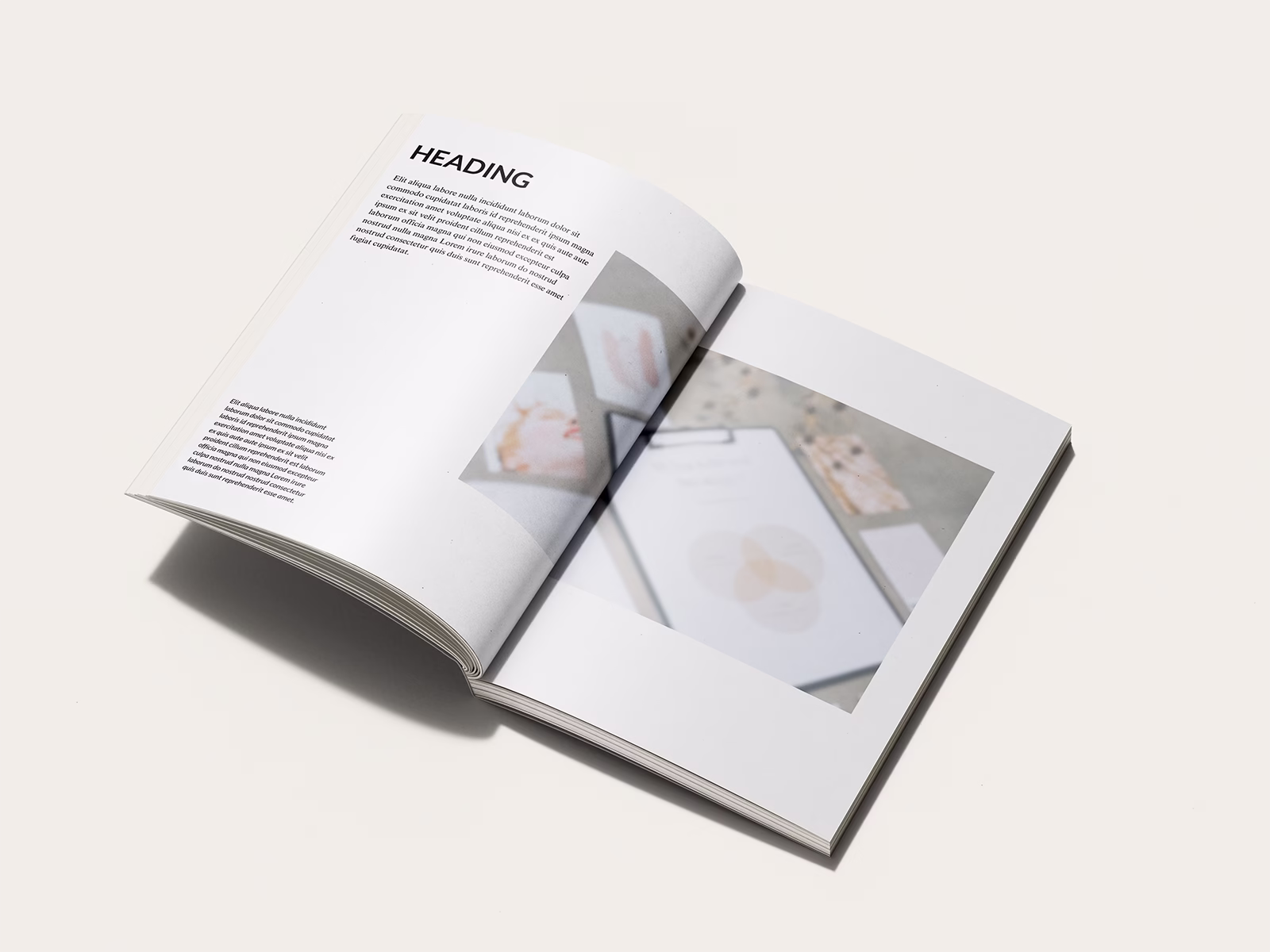 Image of an open book featuring the 'How To" Guide Book Template from Wilsonian Press. The open pages feature the a double page spread image. Templates.